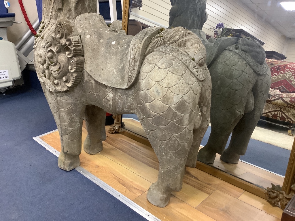 A faux carved marble temple dog, width 86cm, height 110cm